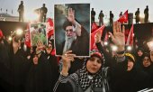 Mourners gather around the coffin of Supreme Leader Ali Khamenei in Karbala on Thursday, 9 July. He was killed four months ago. (© picture alliance / newscom / Iranian Supreme Leader’s Office)