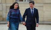 President Nicușor Dan with his partner Mirabela Grădinaru in Paris on 13 July. (© picture alliance / ZUMAPRESS.com / Julien Mattia)