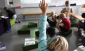 A lesson at Ressu primary school in Helsinki. (© picture-alliance/Lehtikuva/Vesa Moilanen)