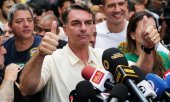 Bolsonaro's strong performance came as a surprise, as pre-election polls had put Lula ahead by around three percentage points. (© picture alliance / AP Photo/Lucas Landau)