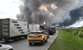 A huge cloud of smoke above Kapotnya District in southeast Moscow. (© picture alliance / Anadolu / Sefa Karacan)
